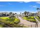 Lush grounds with a view of the waterfront at 845 S Gulfview Blvd # 208, Clearwater Beach, FL 33767