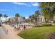 Relaxing pool area with lounge chairs and patio furniture at 845 S Gulfview Blvd # 208, Clearwater Beach, FL 33767