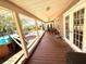 Long wooden back porch overlooking the hot tub at 9850 Hilltop Dr, New Port Richey, FL 34654