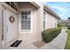 Inviting home exterior with a welcoming front door and well-manicured landscaping at 10010 Bucklin St, Tampa, FL 33625