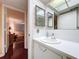 Simple bathroom with vanity, sink and mirror at 1012 Pearce Dr # 211, Clearwater, FL 33764