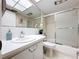 Clean bathroom with a shower/tub combo and vanity at 1012 Pearce Dr # 211, Clearwater, FL 33764