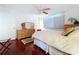 Relaxing bedroom with king-size bed and ceiling fan at 1012 Pearce Dr # 211, Clearwater, FL 33764