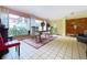 Spacious common area with tiled floor and seating at 1012 Pearce Dr # 211, Clearwater, FL 33764