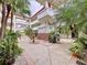 Tropical courtyard with fountain and seating area at 1012 Pearce Dr # 211, Clearwater, FL 33764