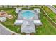 Community pool and clubhouse aerial view at 10399 Gliding Eagle Way, Land O Lakes, FL 34638