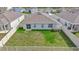 Aerial view of house with fenced backyard at 10399 Gliding Eagle Way, Land O Lakes, FL 34638