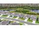 Aerial view of houses and lakefront community at 10399 Gliding Eagle Way, Land O Lakes, FL 34638