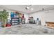 Spacious garage with ample storage shelving at 10399 Gliding Eagle Way, Land O Lakes, FL 34638