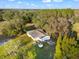 Lovely aerial view of home on land, surrounded by mature trees at 10601 Paul S Buchman, Plant City, FL 33565