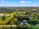 Gorgeous aerial shot of a parcel surrounded by luscious trees at 10601 Paul S Buchman, Plant City, FL 33565