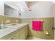 Neutral bathroom featuring an avocado tiled wall at 10601 Paul S Buchman, Plant City, FL 33565