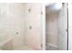 Large walk-in shower with built-in seat and glass enclosure at 11125 Winthrop Lake Dr, Riverview, FL 33578