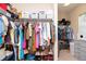 Large walk-in closet with ample shelving and hanging space for clothes and shoes at 11125 Winthrop Lake Dr, Riverview, FL 33578