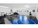 Home gym with wrestling mats and weight equipment at 11307 Wagon Trail Run, Lithia, FL 33547