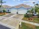 Three-car garage and attractive curb appeal at 11447 Golf Round Dr, New Port Richey, FL 34654