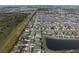 Aerial view of a residential neighborhood with a lake at 11614 Brighton Knoll Loop, Riverview, FL 33579