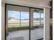 Screened patio overlooking a peaceful lake at 11614 Brighton Knoll Loop, Riverview, FL 33579