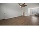 Large bedroom with hardwood floors and ensuite access at 11614 Brighton Knoll Loop, Riverview, FL 33579