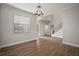 Bright dining room with hardwood floors and a chandelier at 11614 Brighton Knoll Loop, Riverview, FL 33579