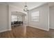 Bright dining room with hardwood floors and a chandelier at 11614 Brighton Knoll Loop, Riverview, FL 33579