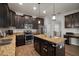 Modern kitchen with stainless steel appliances and granite countertops at 11614 Brighton Knoll Loop, Riverview, FL 33579