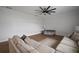 Spacious living room featuring a neutral color palette and ample natural light at 11614 Brighton Knoll Loop, Riverview, FL 33579