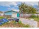 Detached garage with a large driveway, needs some landscaping at 120 80Th N Ave, St Petersburg, FL 33702