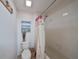 Clean bathroom with shower/tub combo, toilet, and beachy decor at 12127 Luftburrow Ln, Hudson, FL 34669