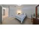 Cozy bedroom with a double bed and ample closet space at 12127 Luftburrow Ln, Hudson, FL 34669