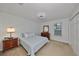 Bright bedroom with double bed, dresser and plenty of closet space at 12127 Luftburrow Ln, Hudson, FL 34669