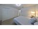 Spacious bedroom with double bed, dresser and large closets at 12127 Luftburrow Ln, Hudson, FL 34669