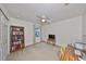 Bright bedroom with bookcase, desk, and window at 12127 Luftburrow Ln, Hudson, FL 34669