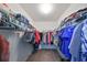 Large walk-in closet with ample shelving and hanging space at 12127 Luftburrow Ln, Hudson, FL 34669