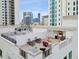 Shared rooftop terrace with lounge chairs and grilling area at 146 4Th Ne Ave # 504, St Petersburg, FL 33701