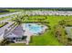 Aerial view of resort-style community pool with lounge area at 14690 Horse Trot Rd, Lithia, FL 33547