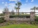 Community entrance sign for Hawkstone, featuring stone pillars and landscaping at 14690 Horse Trot Rd, Lithia, FL 33547