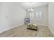 Light-filled dining room featuring tile floors and a stylish ottoman at 14690 Horse Trot Rd, Lithia, FL 33547