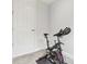 Basement exercise room with stationary exercise bike at 14690 Horse Trot Rd, Lithia, FL 33547