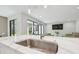 Modern kitchen sink with a sleek faucet and white quartz countertop at 14690 Horse Trot Rd, Lithia, FL 33547