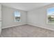 Bright bedroom featuring neutral walls and carpet at 1740 W Saint Louis St, Tampa, FL 33607