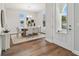 Dining room with hardwood floors, wooden table, and gray chairs at 1740 W Saint Louis St, Tampa, FL 33607