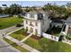 Two-story house with a landscaped yard and a white fence at 1740 W Saint Louis St, Tampa, FL 33607