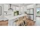 Sleek kitchen with white cabinets and stainless steel appliances at 1740 W Saint Louis St, Tampa, FL 33607