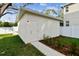 Detached storage shed with concrete pathway at 1740 W Saint Louis St, Tampa, FL 33607