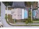 Top-down view of house with pool and yard at 17436 Lawn Orchid Loop, Land O Lakes, FL 34638