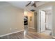 Bedroom with access to a full bathroom and another bedroom at 17436 Lawn Orchid Loop, Land O Lakes, FL 34638