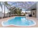 Enjoy this beautiful screened pool with a large patio area at 17436 Lawn Orchid Loop, Land O Lakes, FL 34638