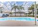 Inviting screened pool with ample deck space at 17436 Lawn Orchid Loop, Land O Lakes, FL 34638