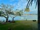 Scenic waterfront view with lush landscaping at 1847 Shore S Dr # 316, South Pasadena, FL 33707